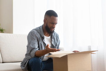 Angry guy disappointed with buying in box