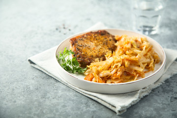 Pork cutlet with sauerkraut stew