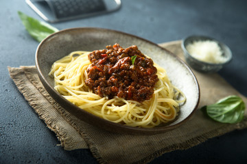 Homemade traditional pasta Bolognese with minced meat and tomato sauce