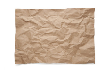 Wrinkled brown craft paper. Isolated sheet on white background