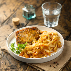 Pork cutlet with sauerkraut stew