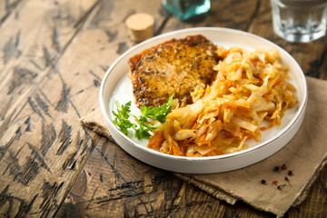 Pork cutlet with sauerkraut stew