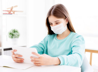 Lovely girl in protective mask