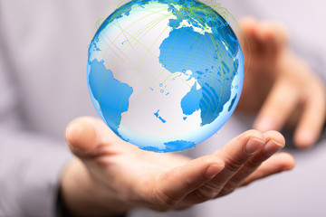 Hand Holding World digital 3d.