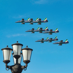 Italian aerobatic team Frecce Tricolori (Tricolor arrows) performs the show with aircrafts at Bari (ITALY) Airshow on the feast of St. Nicholas May 8, 2019. The characteristic lamppost of the Bari wat