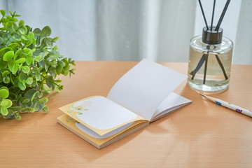 Small notepad placed on the table