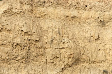 Sandy wall on the oceanic coast of the Algarve