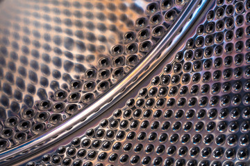 perforated metallic drum inside the washing machine