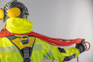 Fototapeta premium Man in personal protective equipment against falling from a height