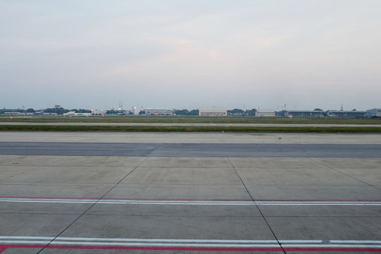 Parked Aircraft Near The Hangar. Cargo Plane On The Airfield. Commercial Air Freight. Sunset Spotting At The Airport. - Image