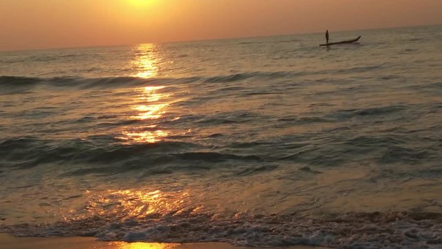 4K Sunrise over tropical island beach and palm trees. Phuket beach sea, View of beach sea on sun light in the summer. Colorful sunset over the beach in the tropical beach sea,the tropical paradise bea