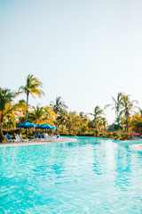 Obraz premium Beautiful luxury landscape around pool in hotel resort