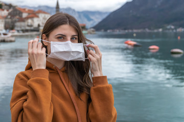 Girl with mask to protect her from Corona virus. Corona virus pandemic