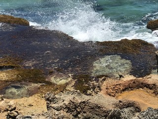 waves crashing on rocks
