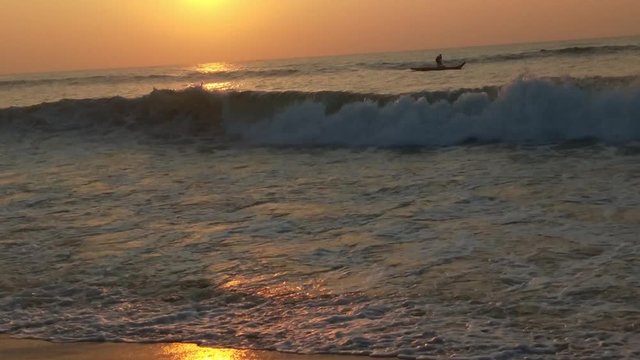 4K Sunrise over tropical island beach and palm trees. Phuket beach sea, View of beach sea on sun light in the summer. Colorful sunset over the beach in the tropical beach sea,the tropical paradise bea