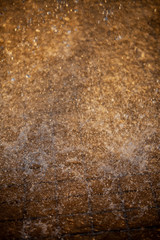 Splashes of water and bokeh of Water on a Sunset Background.