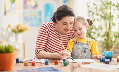 Happy family painting together.
