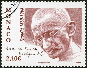 MONACO - 2019: shows portrait of Mahatma Mohandas Karamchand Gandhi (1869-1948), God is Thruth, 2019
