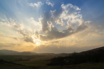 Sunrise or sunset over the hills and meadow. Slovakia