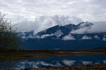 Fototapeta na wymiar clouds over the mountains in Tibet, China