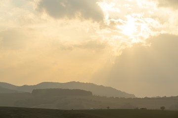 Sunrise or sunset over the hills and meadow. Slovakia