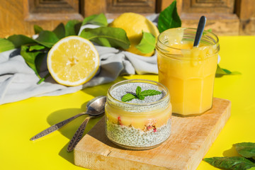 Chia pudding with homemade granola, lemon curd for breakfast