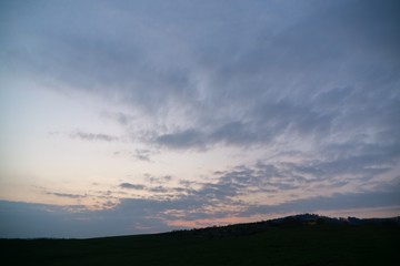 Sunrise or sunset over the hills and meadow. Slovakia