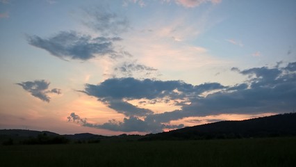 Sunrise or sunset over the hills and meadow. Slovakia