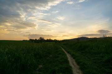 Sunrise or sunset over the hills and meadow. Slovakia