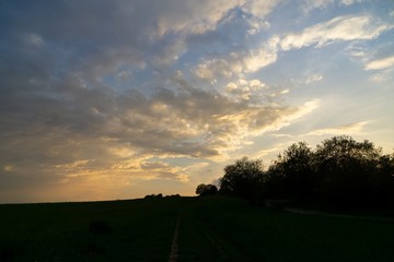 Sunrise or sunset over the hills and meadow. Slovakia