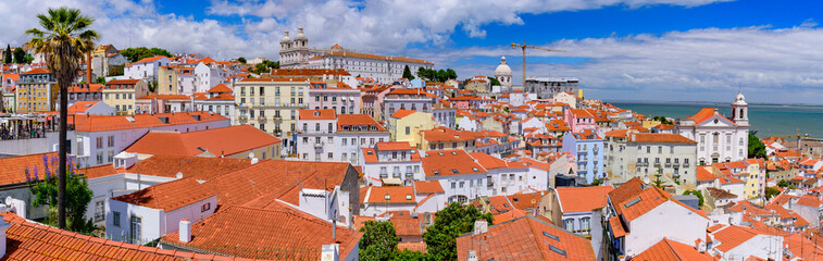Fototapeta na wymiar Panorama of the city & Tagus River from Miradouro de Santa Luzia, an observation deck in Lisbon, Portugal