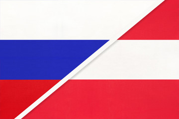 Russia vs Austria national flag from textile. Relationship and partnership between two countries.
