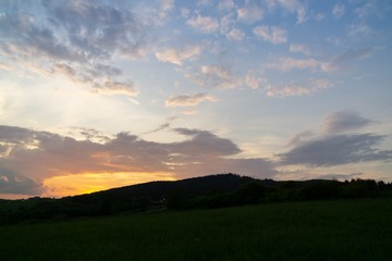 Obraz premium Sunrise or sunset over the hills and meadow. Slovakia