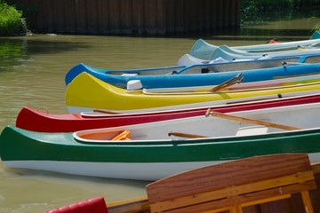 Canoes parked on the riverside