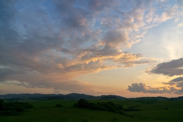 Sunrise or sunset over the hills and meadow. Slovakia