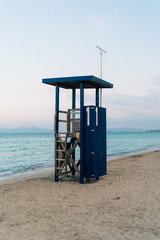 Blue life guard tower in beautiful beach in north of Majorca, Spain