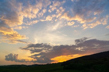 Sunrise or sunset over the hills and meadow. Slovakia