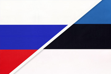 Russia vs Republic of Estonia national flag from textile. Relationship and partnership between two countries.