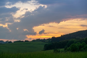 Fototapeta na wymiar Sunrise or sunset over the hills and meadow. Slovakia