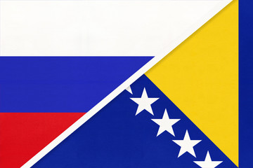 Russia vs Bosnia and Herzegovina national flag from textile. Relationship and partnership between two countries.