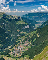 Fototapeta premium Switzerland, Panoramic view on Wengen and green Alps around
