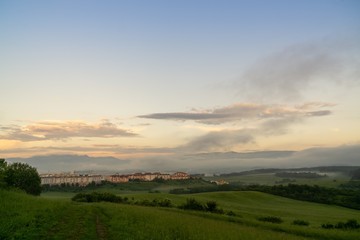 Obraz premium Sunrise or sunset over the hills and meadow. Slovakia