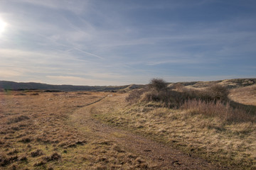 Valley in the dunes with a narrow footpath