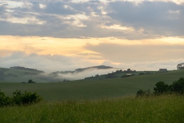 Sunrise or sunset over the hills and meadow. Slovakia