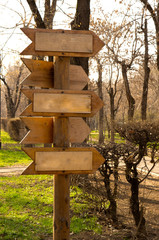 Wooden pole with direction indicators