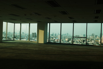 empty floor and cityscape outside the window with sunset sky of modern city from window, Large Hall, Store, interior, perspective wide angle. - Image