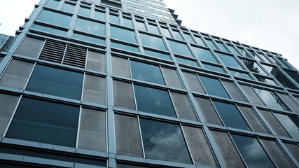 Fototapeta na wymiar exterior of glass residential building.business concept.Modern business building.