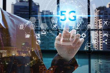 World map with 5G technology background, hand touch network using 5G technology with virtual screen icons on a black background, Technology Internet 5G global network concept.