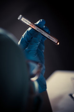 Hand holding a coronavirus COVID-19 test tube