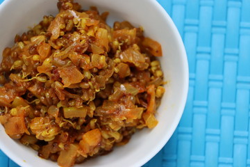 Matki Usal is a very common, vegan and healthy Maharashtrian dry curry (sabzi) made using sprouted matki or moth beans, protein rich, traditional Indian dish 